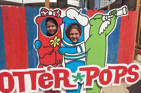 Otter Pops Logo and graphics painted on a fence