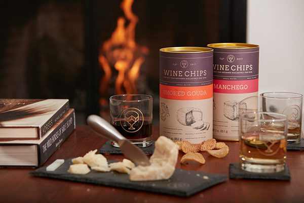 Wine Chips with a cheese board and glasses of whiskey 